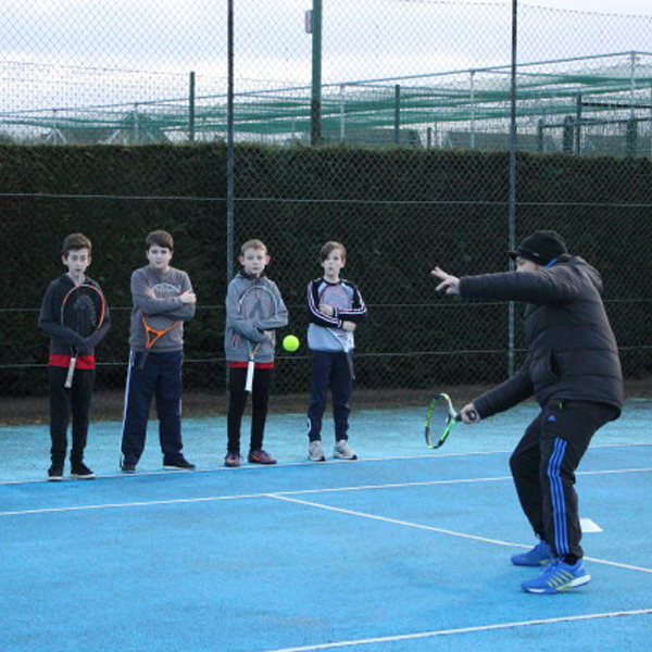 Tennis Club practice on the courts at KWMCC